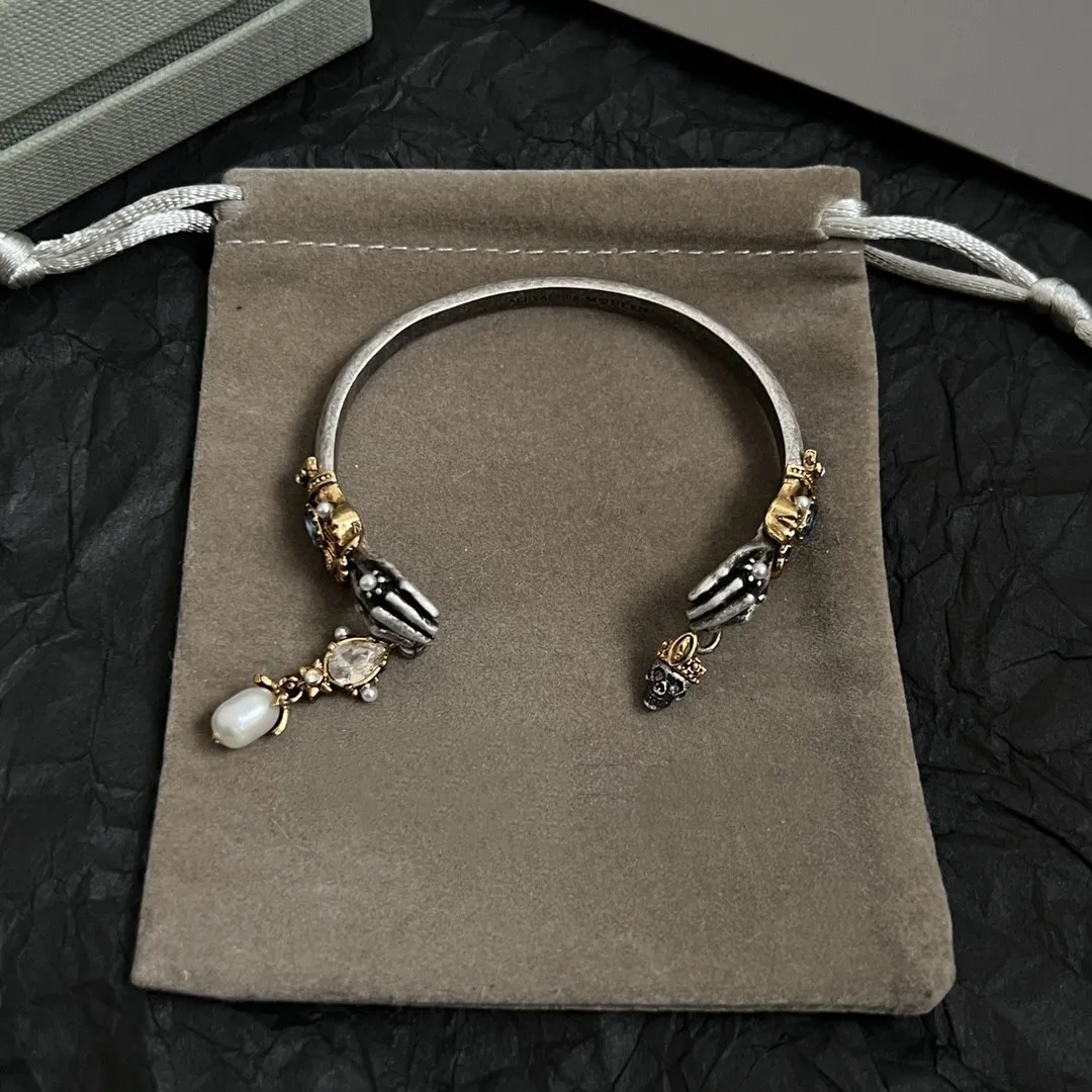 

vintage stainless steel bracelet for women with adjustable skull pearl opening