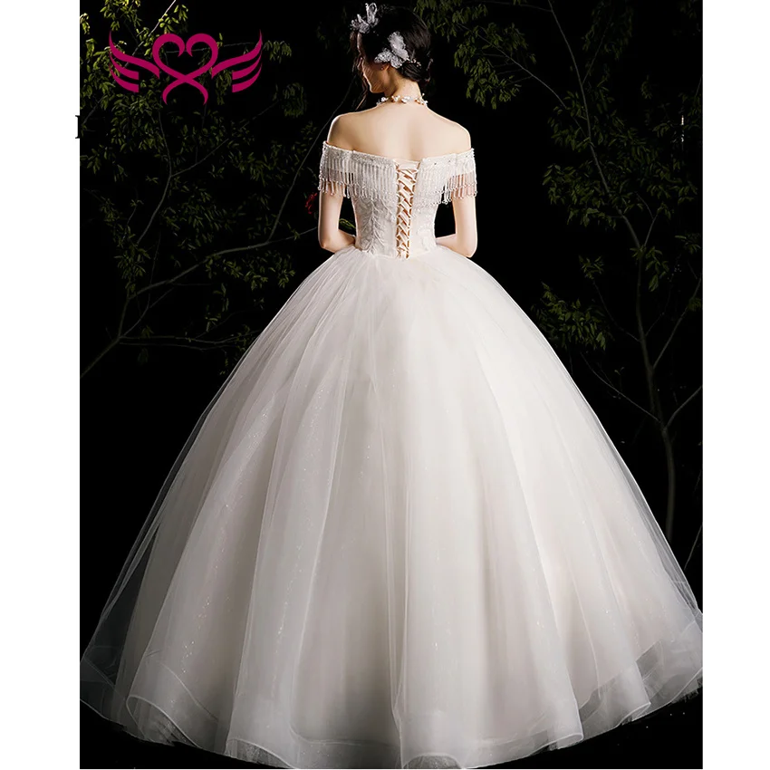 カスタマイズされたオフショルダークリスタルタッセルウェディングドレス夜会服 V ネック光沢のあるチュールエレガントなシンプルな花嫁ドレスヨーロッパ WX0457