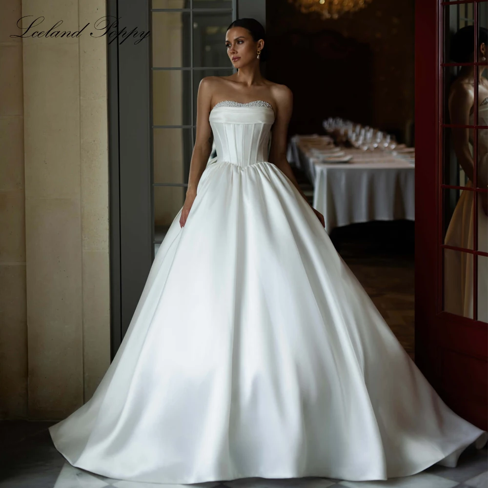 

Lceland Poppy Customized Strapless Ball Gown Satin Wedding Dresses Pearls Beaded Bridal Gowns with Court Train
