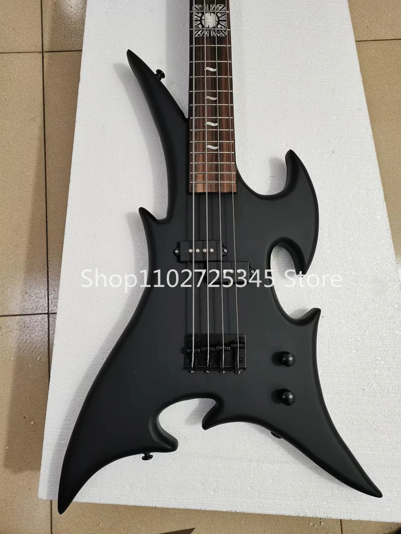 4 string bass, matte black paint, black accessories, rose wood fingerboard, customizable