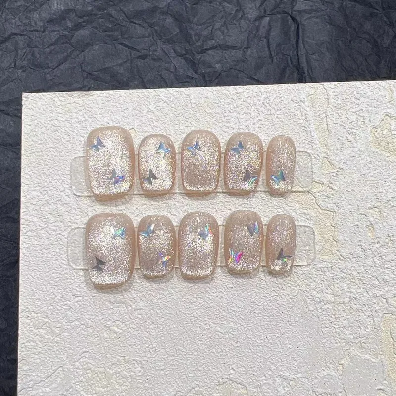 

10Pcs Champagne Colored Nude Cat Eyes Fake Nails Glitter Handmade Laser Butterfly Sticker Full Cover Nail Short Square Nail Tips