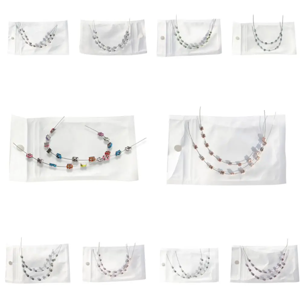

1 Pair Colorful Temporary Tooth Decoration Dental Decorations with Metal Wires Orthodontic Ligature Ties Braces Fake Brackets