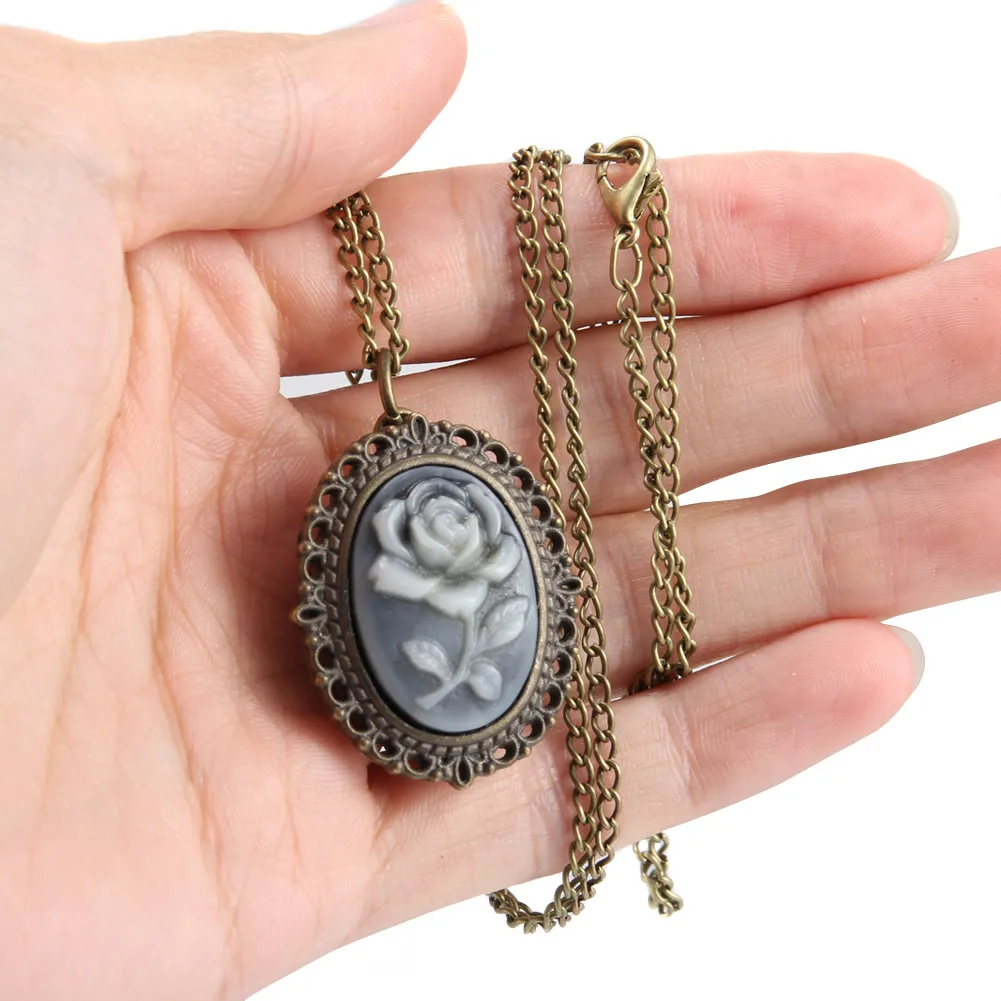 حافظة بيضاوية منحوتة بالزهور مع سلسلة ، ساعة جيب للرجال والنساء ، 1 * *