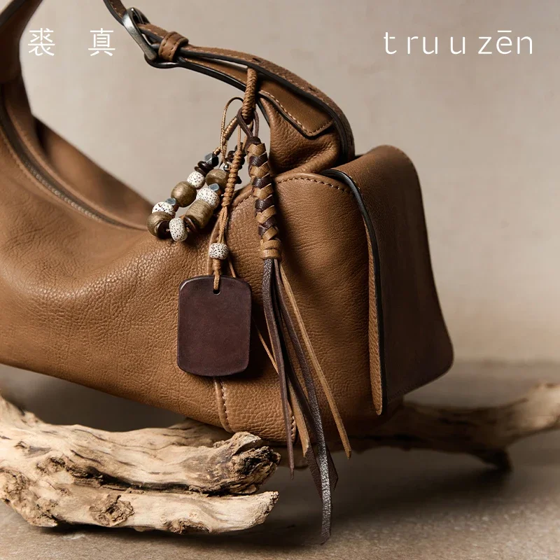

Qiuzhen tanned cowhide heart-shaped hanging accessories for bags - a small-scale designer fashion accessory series