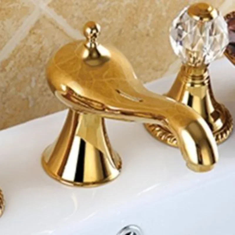 

Manijas de cristal del grifo del lavabo del bano