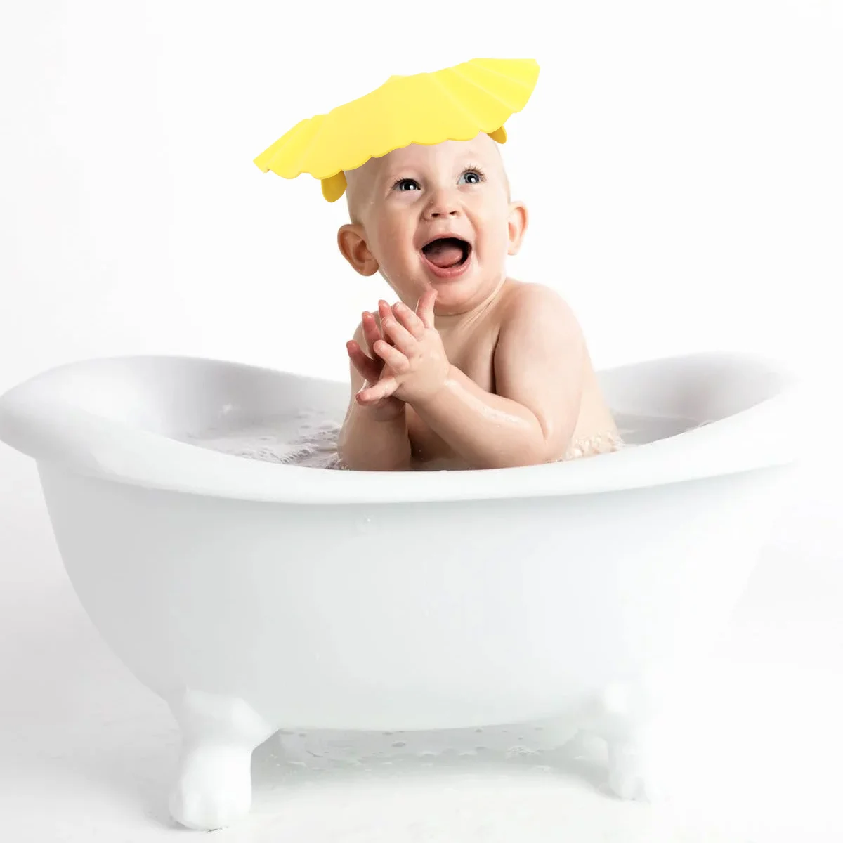 귀 보호 패드가 있는 유아용 샴푸 보호 모자 40-55Cm 3M-6Y 조절 가능한 핏 밝은 색상 물 흐름 슬롯 디자인