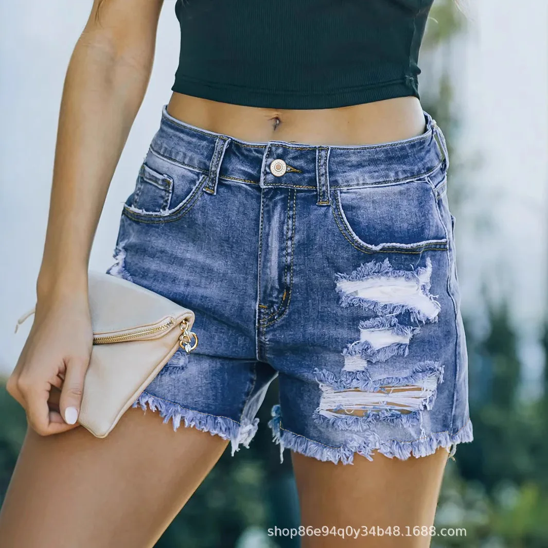 أوروبا أمريكا الجديدة غسلها ممزق الدينيم السراويل. شورت فضفاض كاجوال بتصميم شرابة عصري ومتعدد الاستخدامات للنساء في الصيف