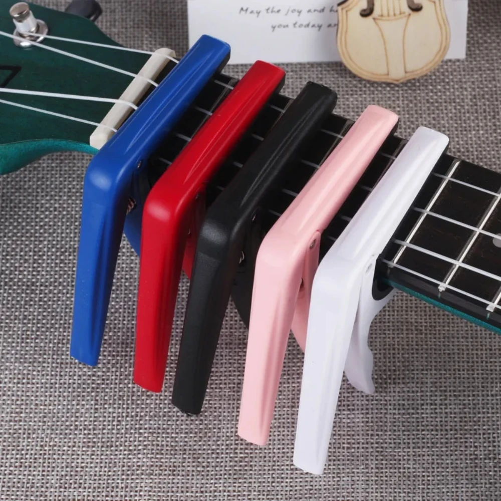 Pro Ukulele Capo,Single-handed Quick Change Mini 4 String Ukulele Capo Guitar Accessories & Parts