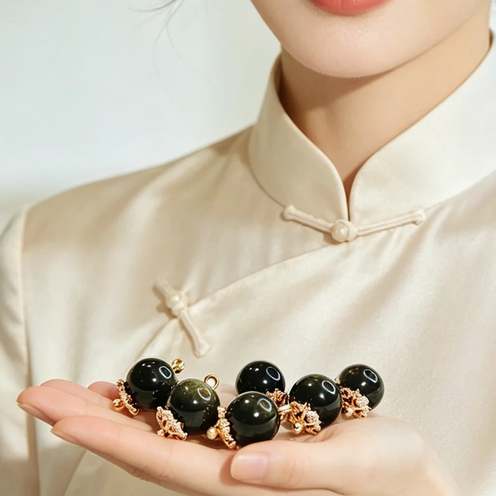天然ブラックオブシディアン球体ボタン、花柄の金属装飾付き-–-高級衣料品やオーダーメイドプロジェクト向けの光沢のある宝石球体