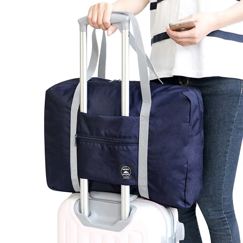 Solid color foldable travel bag Men's and women's clothing bag Shopping shoulder bag with large pull-over luggage bag