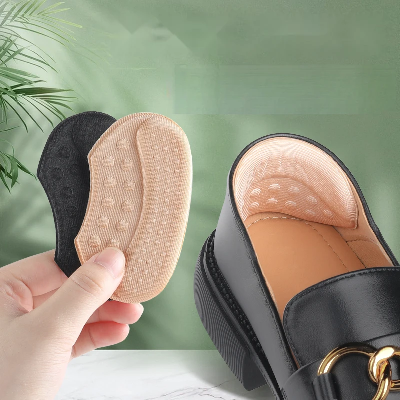 1pair Ingyenélő matrica inserts Ingyenélő cups protectors csúszásgátló igazító méret Félcipő Lábszárvédő számára Magas légnyomású levegő heels anti-wear Cipőnyelv Lábszárvédő számára Nők Férfi