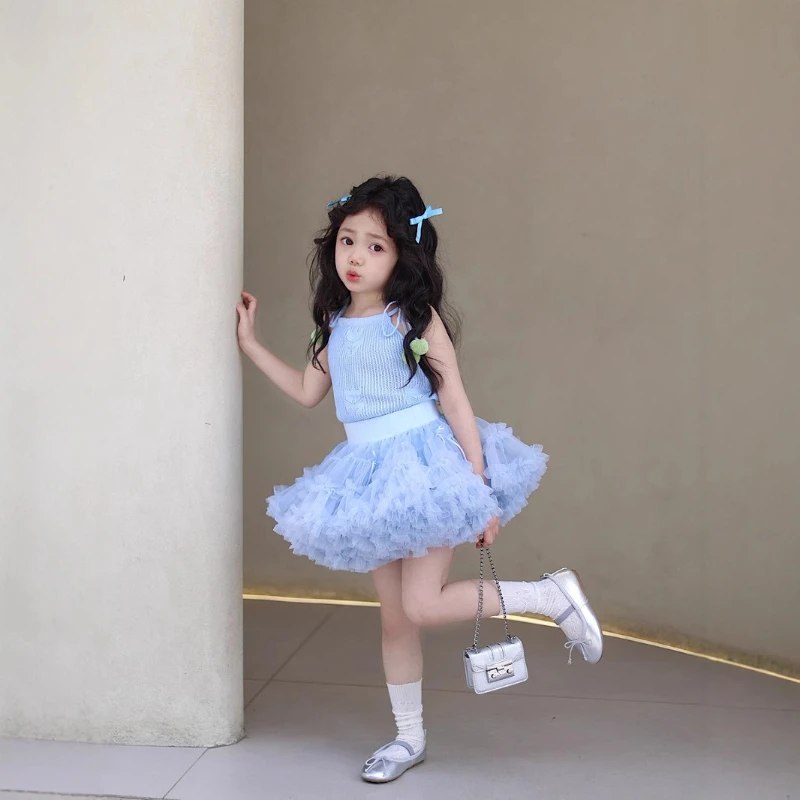 2026 Summer Hot Selling Girls' Blue Knitted Lace up Vest and High Waisted Multi-layer Mesh Skirt Two-piece Set