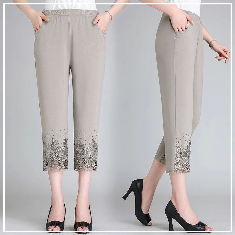 

2024 New Summer Fashionable Trendy High Waist Slim Hollow Jacquard Straight Leg Pants for Middle Aged and Elderly Women's Wear