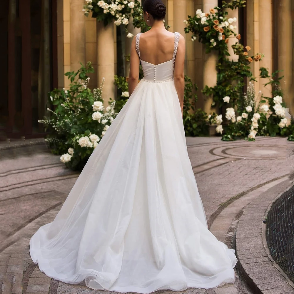 Moderno sereia até o chão vestido de casamento sexy fenda lateral sem mangas pérolas e frisado plissado noiva personalizado vestido de novia