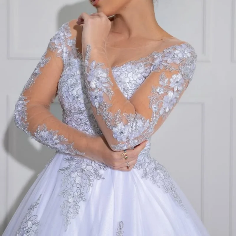 Op maat gemaakte ivoorwitte spaghettibandjes Kant Applicaties Trouwjurken Lange mouwen kralen satijnen bruidsjurken Gemaakt jurk