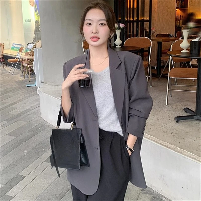 Abito piccolo da donna nuova primavera e autunno versione coreana piccolo design senso vento pigro giacca da donna con spacco grande