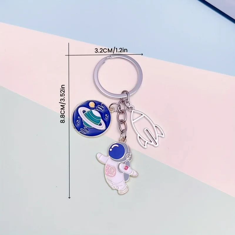 1Astronaut and rocket keychain set，Zinc Alloy Space Theme Keychain，Planet and astronaut pendant，For astronomy enthusiasts，Bag Pe