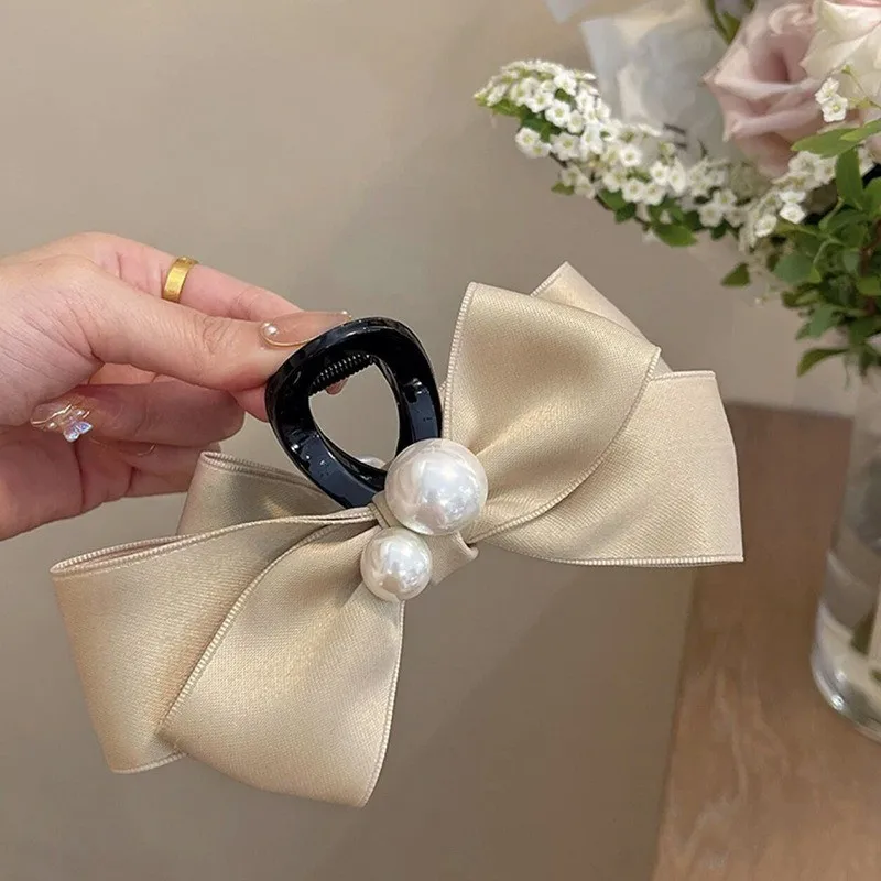 不規則なパールリボンヘアピンレディース気質サメクリップファッショナブルな女の子のヘアアクセサリー