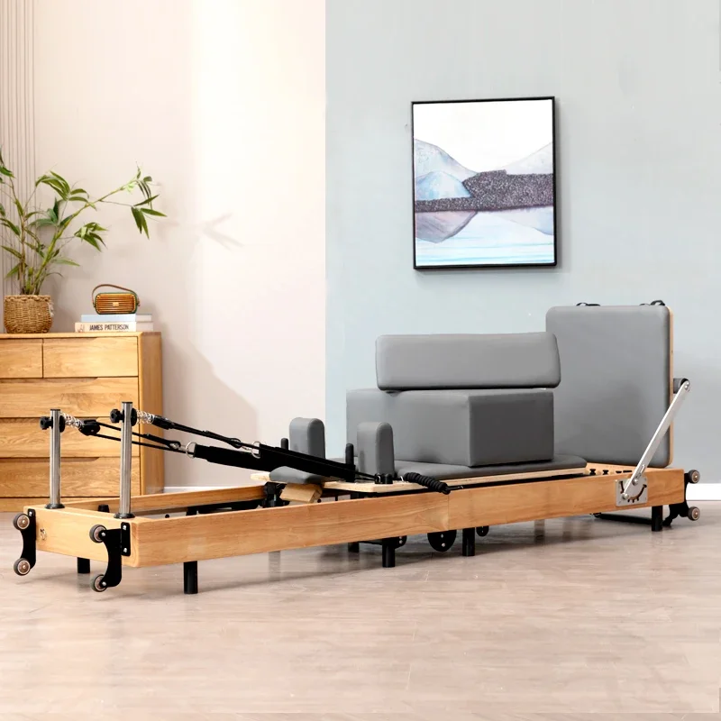 مصلح بيلاتيس عالي الجودة من خشب البلوط قابل للطي سريع الطي لليوجا معدات لياقة بدنية كبيرة سرير بيالتيس منزلي تجاري