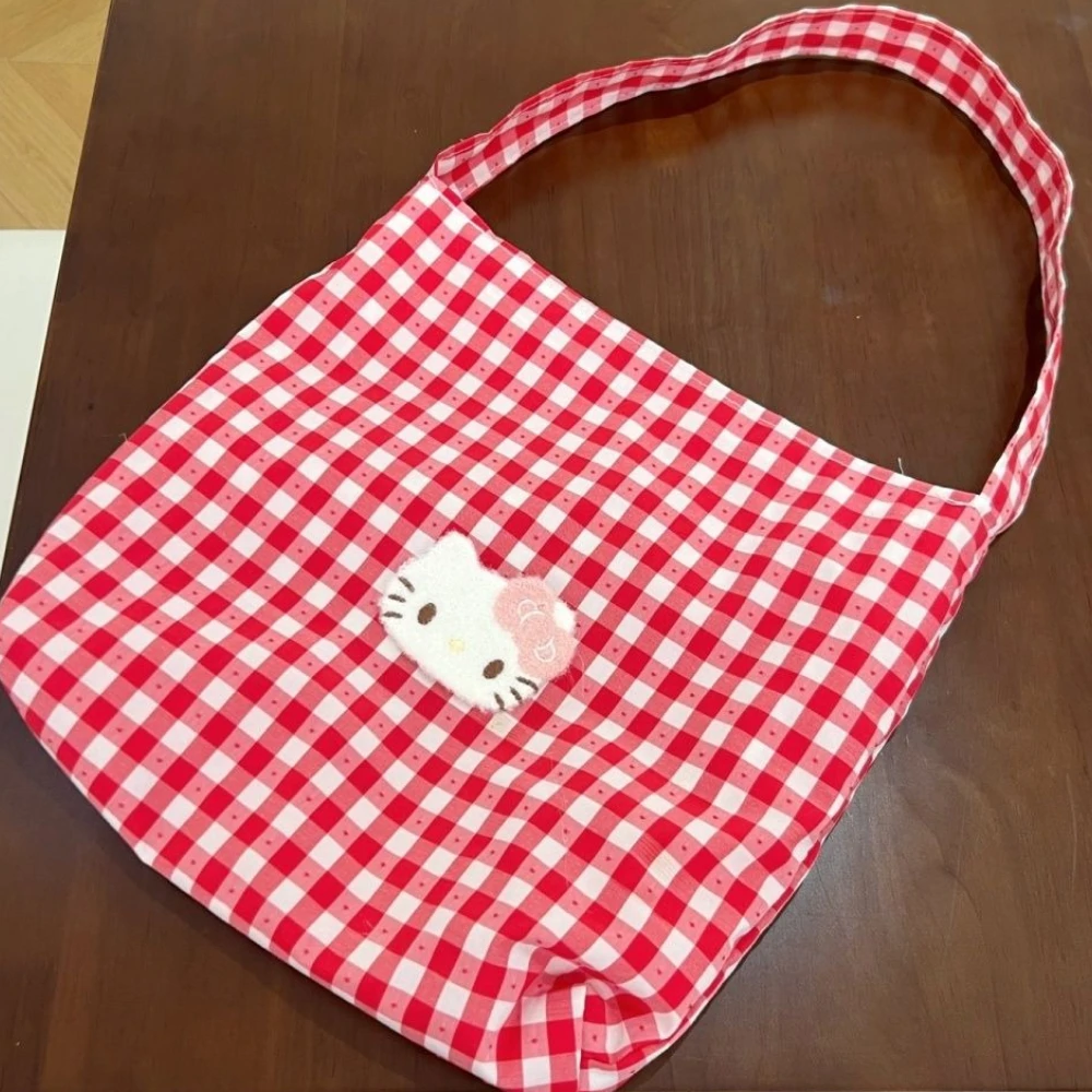 

Cute Sanrio Hello Kitty red plaid shoulder bag new style cartoon large capacity tote bag commuting bag Girls' Women's handbag