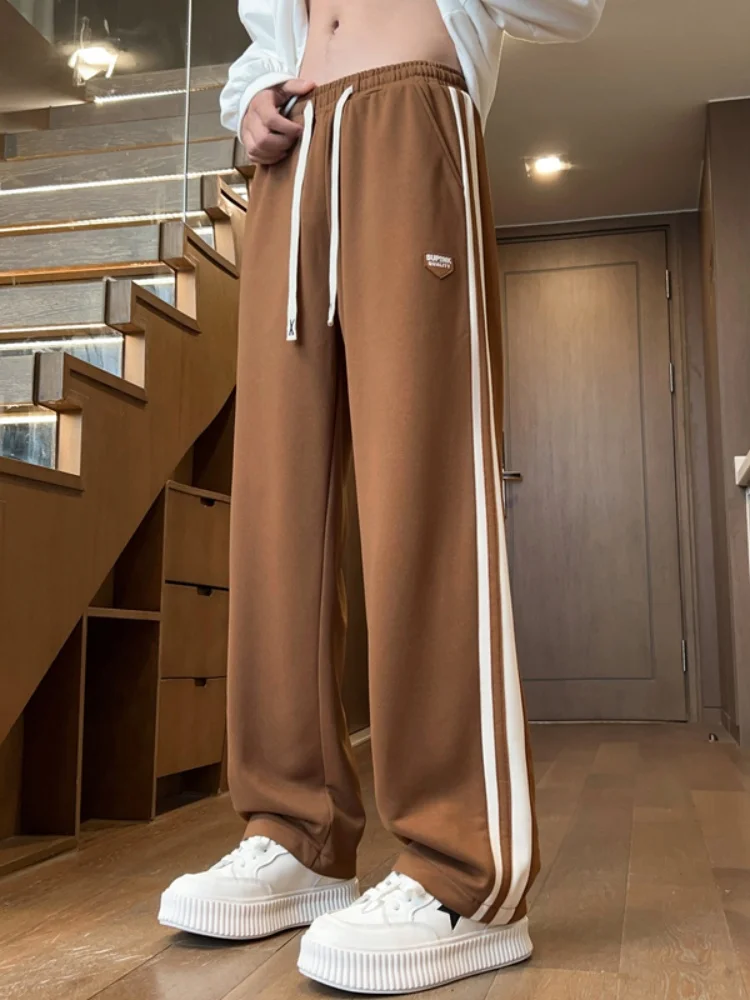 

Мужские повседневные спортивные брюки свободного кроя, плотные, с полосатыми вставками, широкие, струящиеся, весенние, модные, брендовые, в уличном стиле, свободного кроя