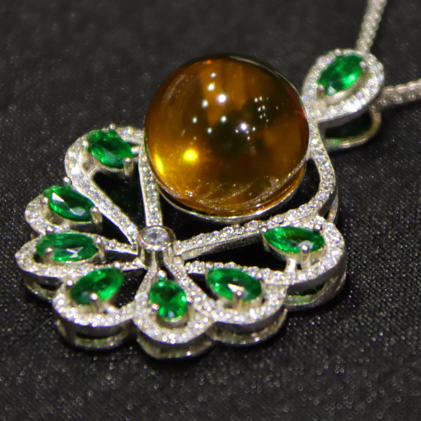 Pure Silver Necklace with Natural Mexican Blue Amber Pendant 13mm Surrounded by Green Gemstones on Sterling Silver Chain