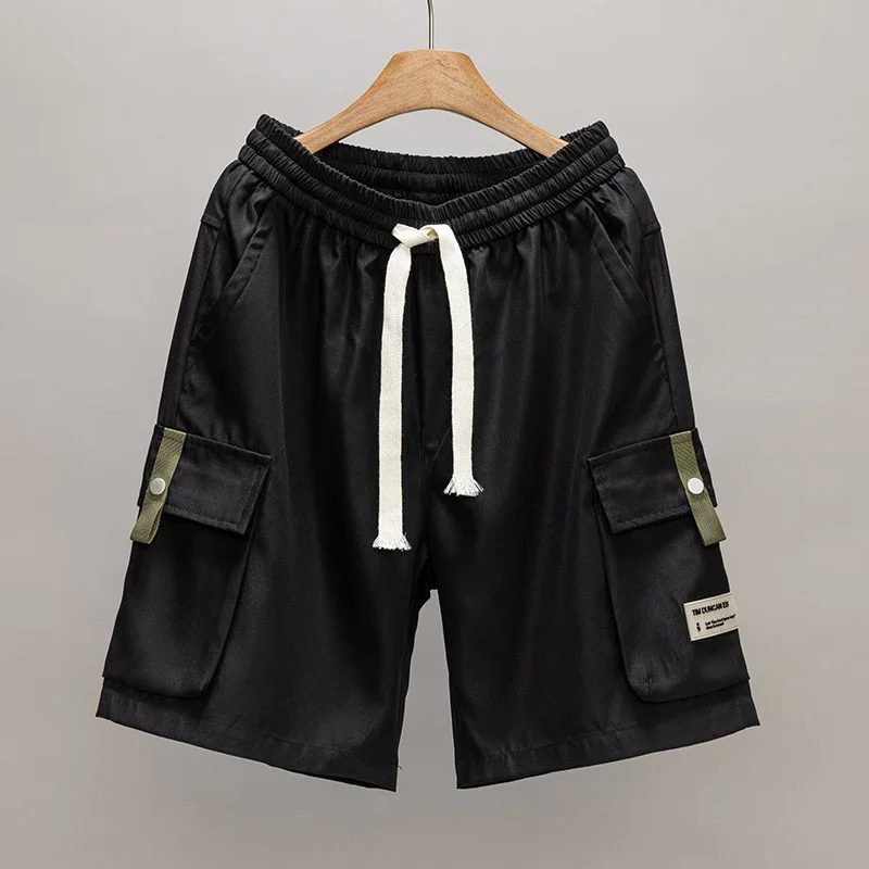 กางเกงขาสั้นทำงานทรงหลวมไซส์ใหญ่พิเศษ 8XL สำหรับผู้ชาย สไตล์เทคแวร์ กางเกงคาร์โก้ กางเกงกอล์ฟผู้ชาย มีกระเป๋าหลายช่อง กางเกงยุทธวิธี กางเกงขาสั้นลำลองฤดูร้อนสำหรับผู้ชาย