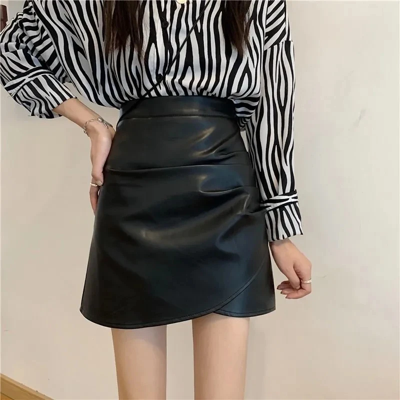 

GIDYQ High Waist PU Leather Skirt Irregular Wrinkles Women Hip Wrap Zipper Short Skirt Sexy Pure Desire Office Lady Hottie New