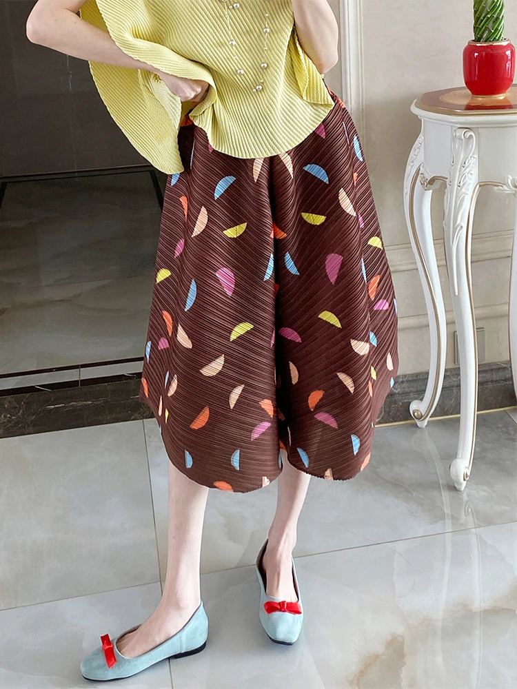 

Women Casual Loose Wide-legged Trousers Retro Print Pattern Irregular Design Fashion Pleated Female Seven Pants 2025 Summer New