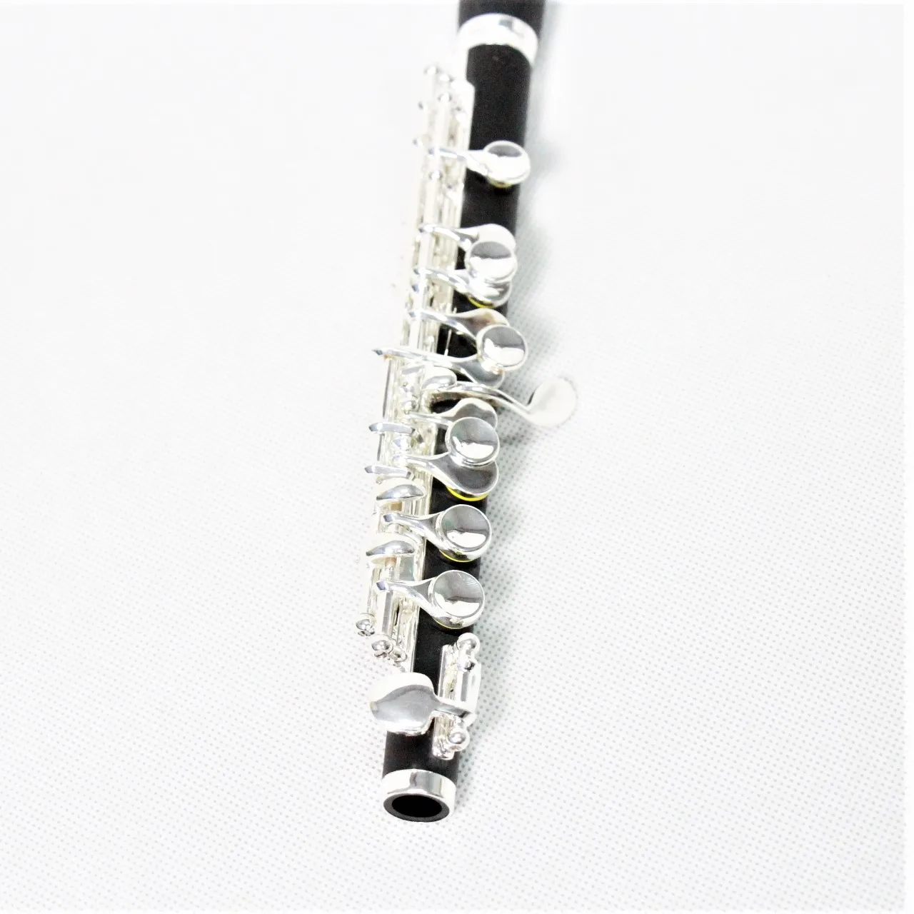 

Economical Piccolo Flute Chinese Factory Price Flute Piccolo Silver Plated Hard Rubber Flute