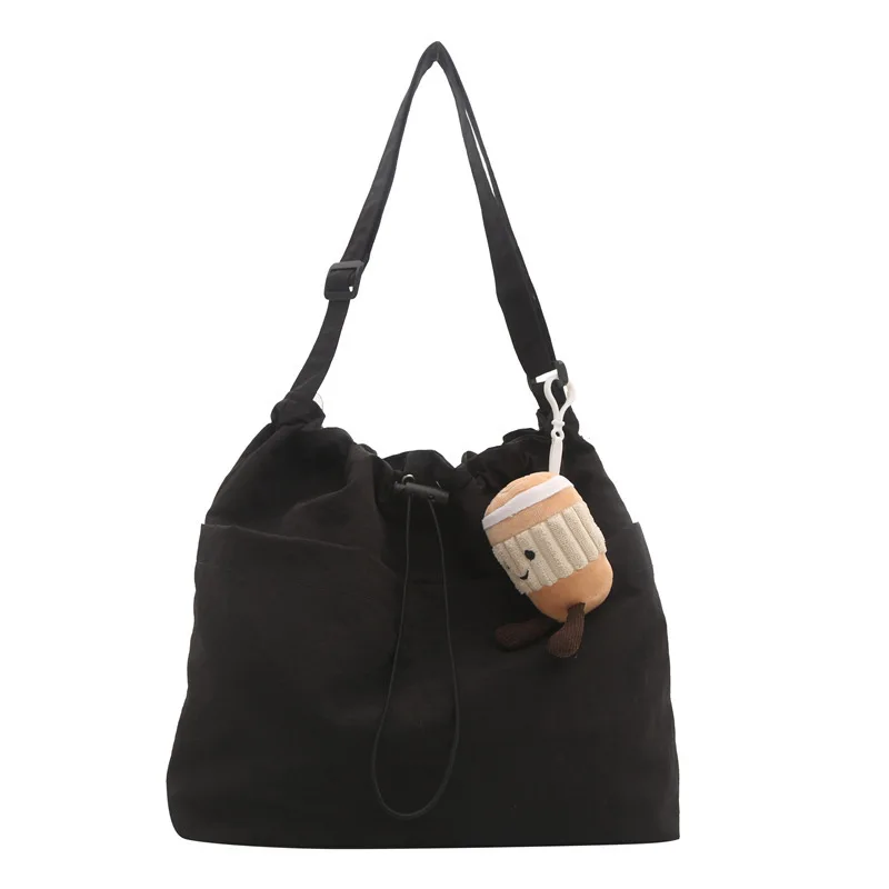 Large capacity drawstring bucket bag bag female 2025 new Japanese ins casual crossbody bag street shoulder commuter bag