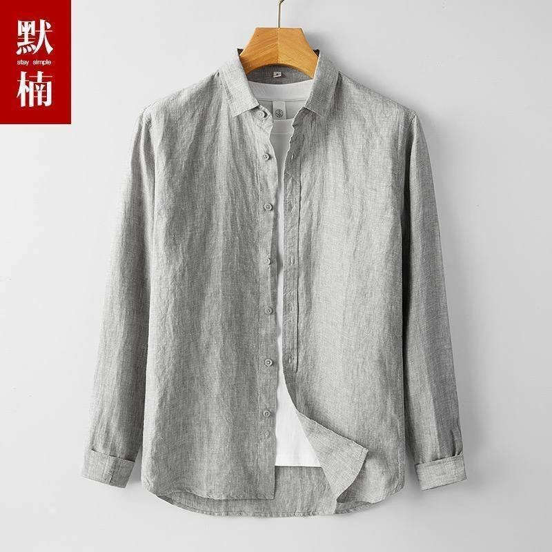 قميص رجالي جديد فضفاض بأكمام طويلة من القطن والكتان، تصميم فني عصري مريح وقابل للتنفس، أسلوب حضري للربيع والخريف بلون موحد