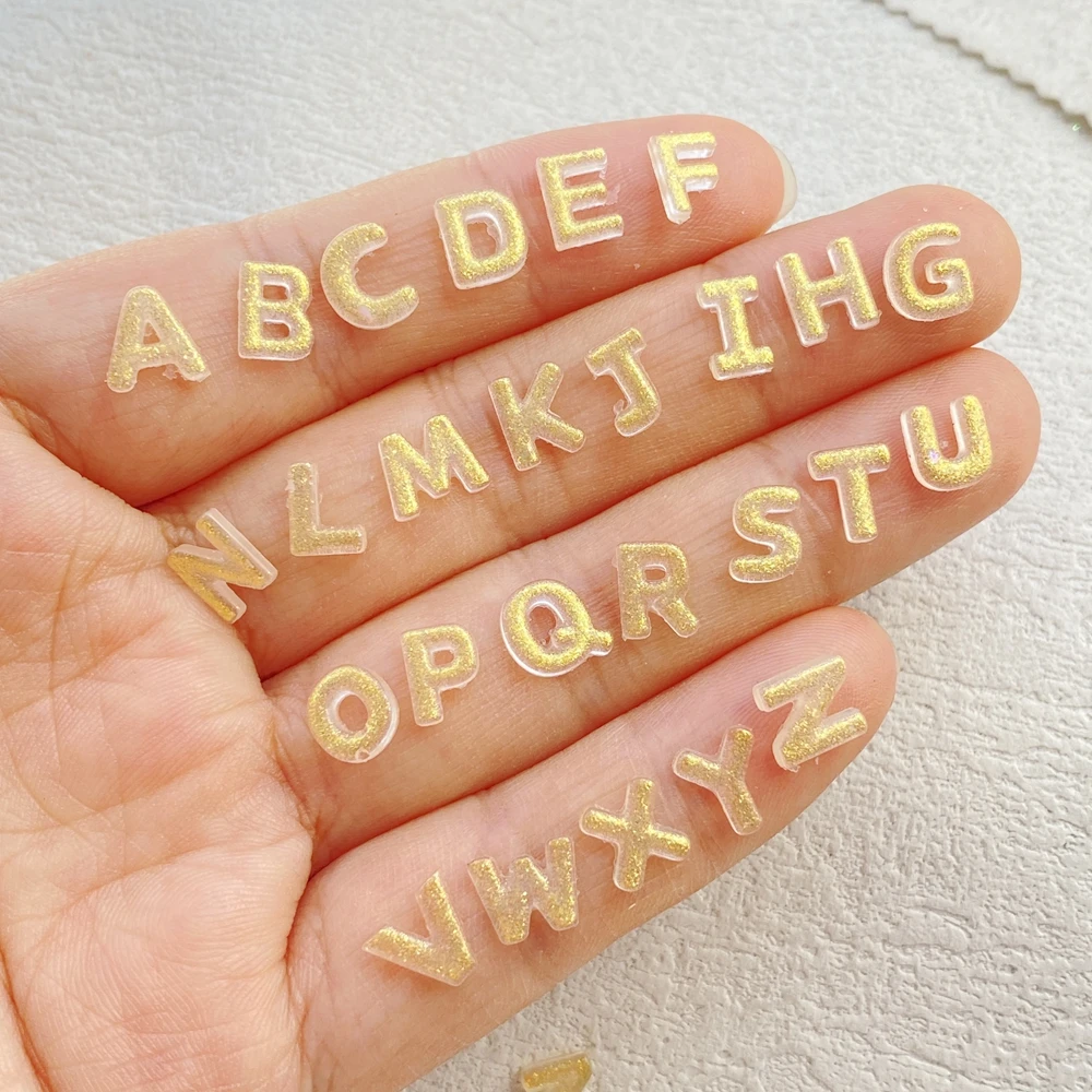 200 pçs resina mista mini dhining 26 letras douradas arte do prego parte traseira plana pedra apliques diy encantos de natal scrapbook decoração artesanato