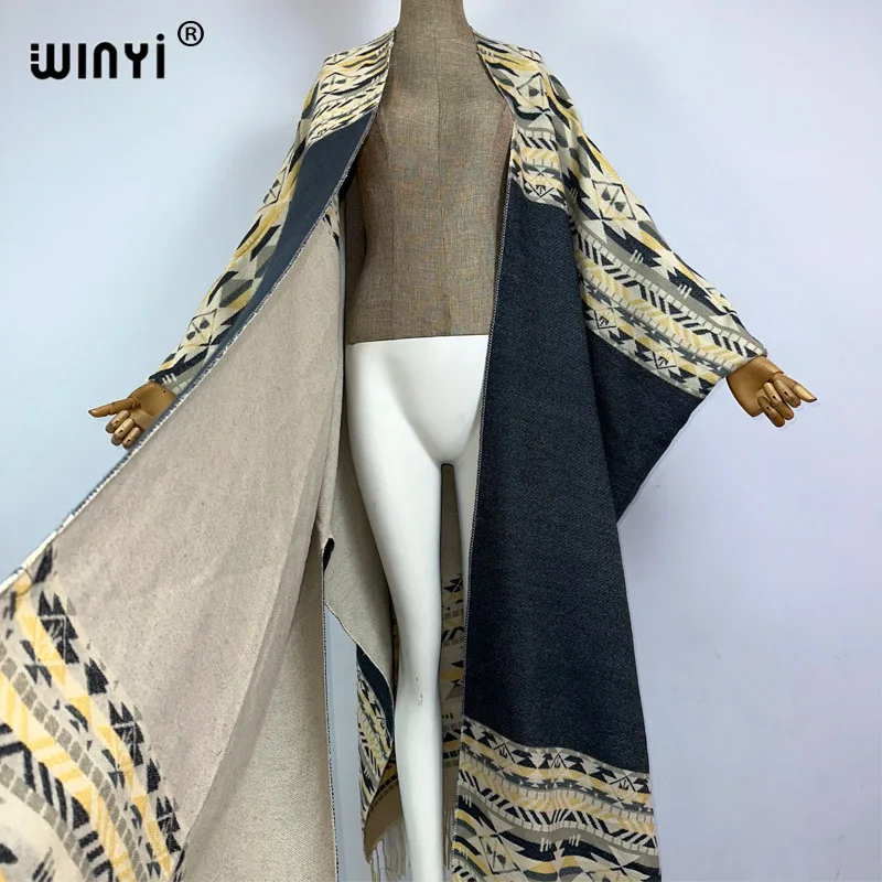 WINYI Winter new cloak Women High Quality poncho tassels Luxury Long Loose OverCoat Thick Warm Female long down coat jacket