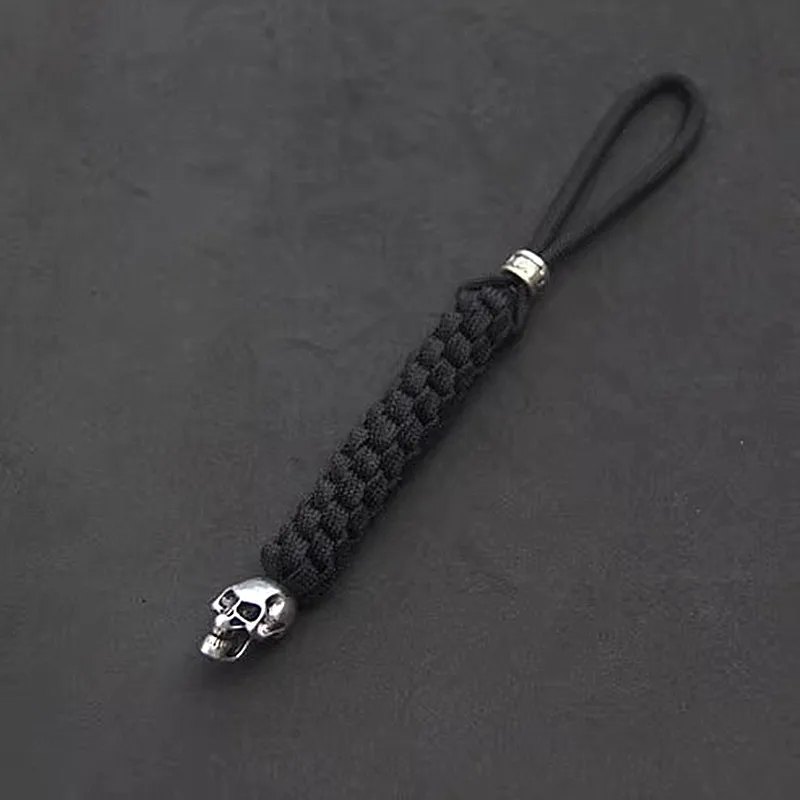 2pcs/lot survival paracord keychain with metal skull & bead