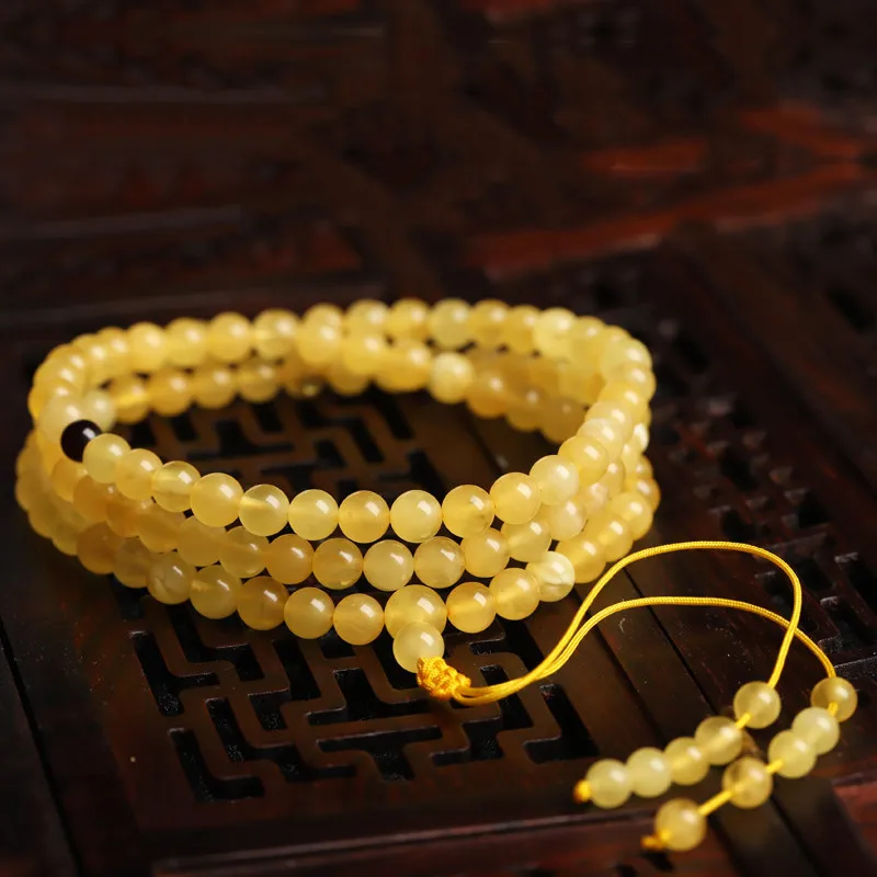 

108 of Buddha Beads Gold Amber Women Beeswax Necklace Bracelet Dual-use Model