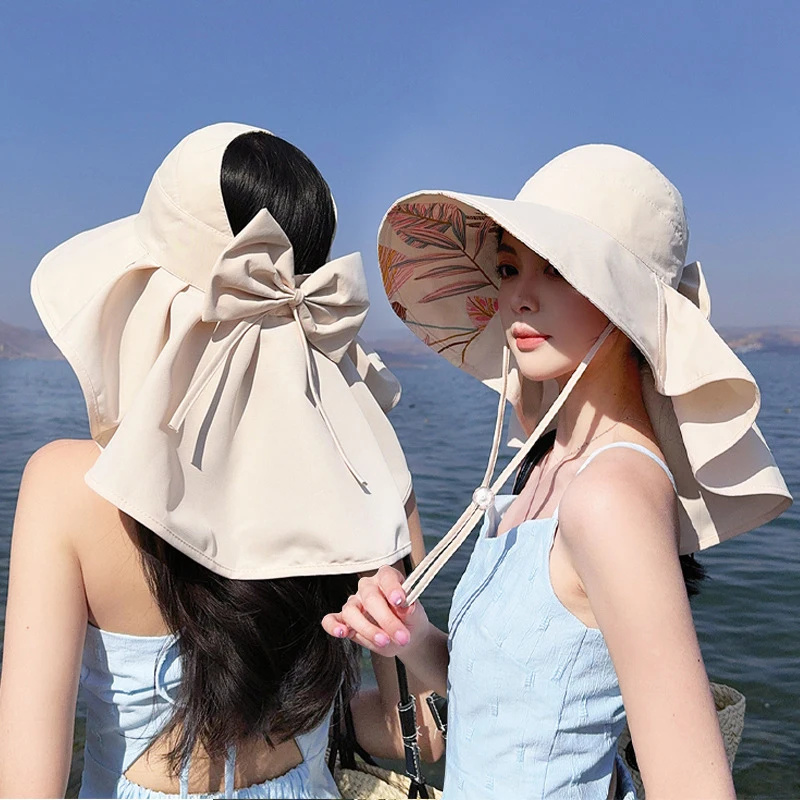 

Women's Summer Sun Hat Wide-Brimmed Fisherman Style with Neck Flap Stylish Bow Accent Cap Open-Top Ponytail-Friendly Design