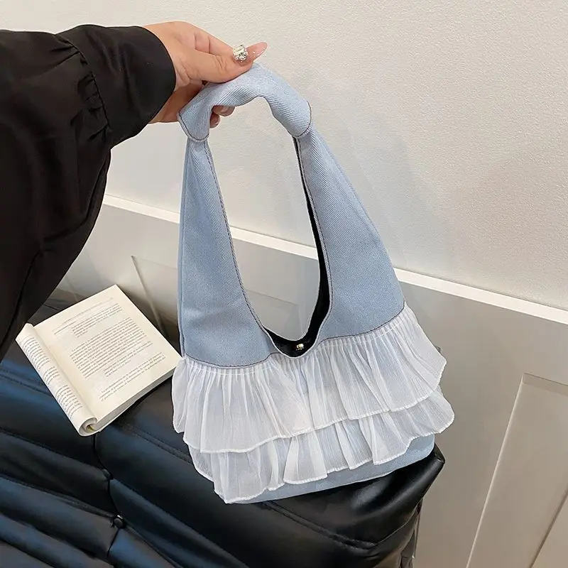 

New women's denim lace patchwork shoulder handbag with large capacity lace, fashionable and versatile tote bag, commuting bag
