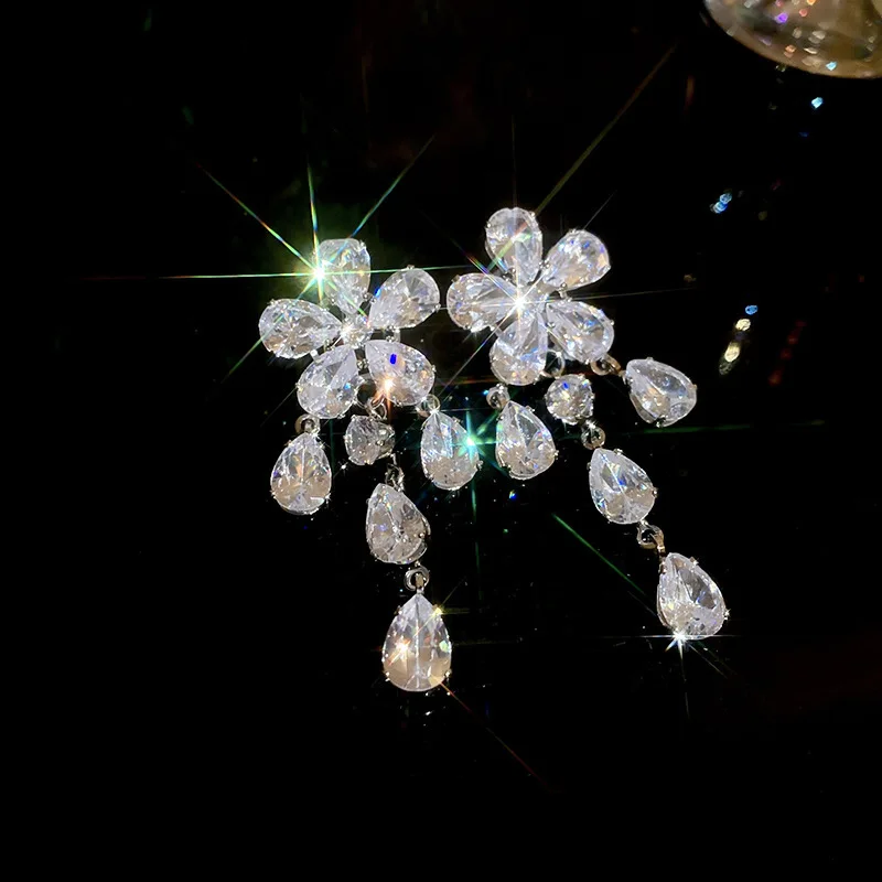 Light luxury zircon flower water drop fringed silver needle earrings, super flash niche temperament elegant high-end earrings