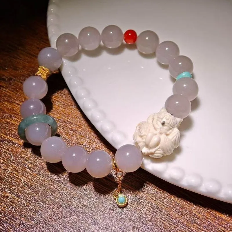 Mammoth Ivory Three-Dimensional Nine-Tailed Purple Bracelet, Paired With A Natural Blue Agate Ring