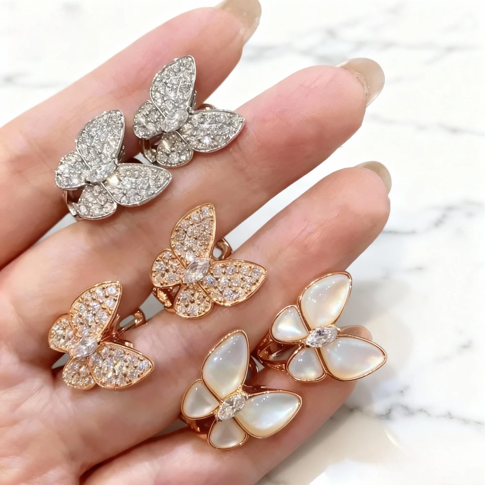 

Модные аксессуары 2025 года. Высококачественные серьги-бабочки в форме белой ракушки, роскошный подарок для друзей.