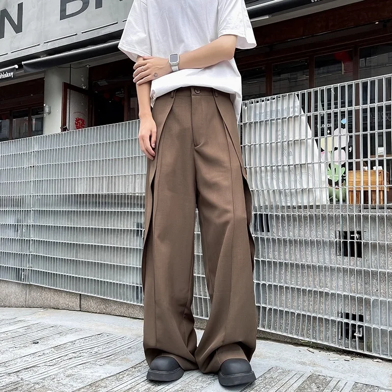 

Deconstructed spliced casual suit pants men vibe American trend loose leg pants summer design draping sexy slightly flared pants