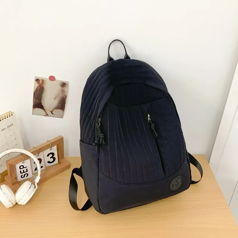 Solid Nylon 2024 High quality Backpack Soft Handle Air Cushion Belt Fashionable Backpack External Frame Soft College Style Bag