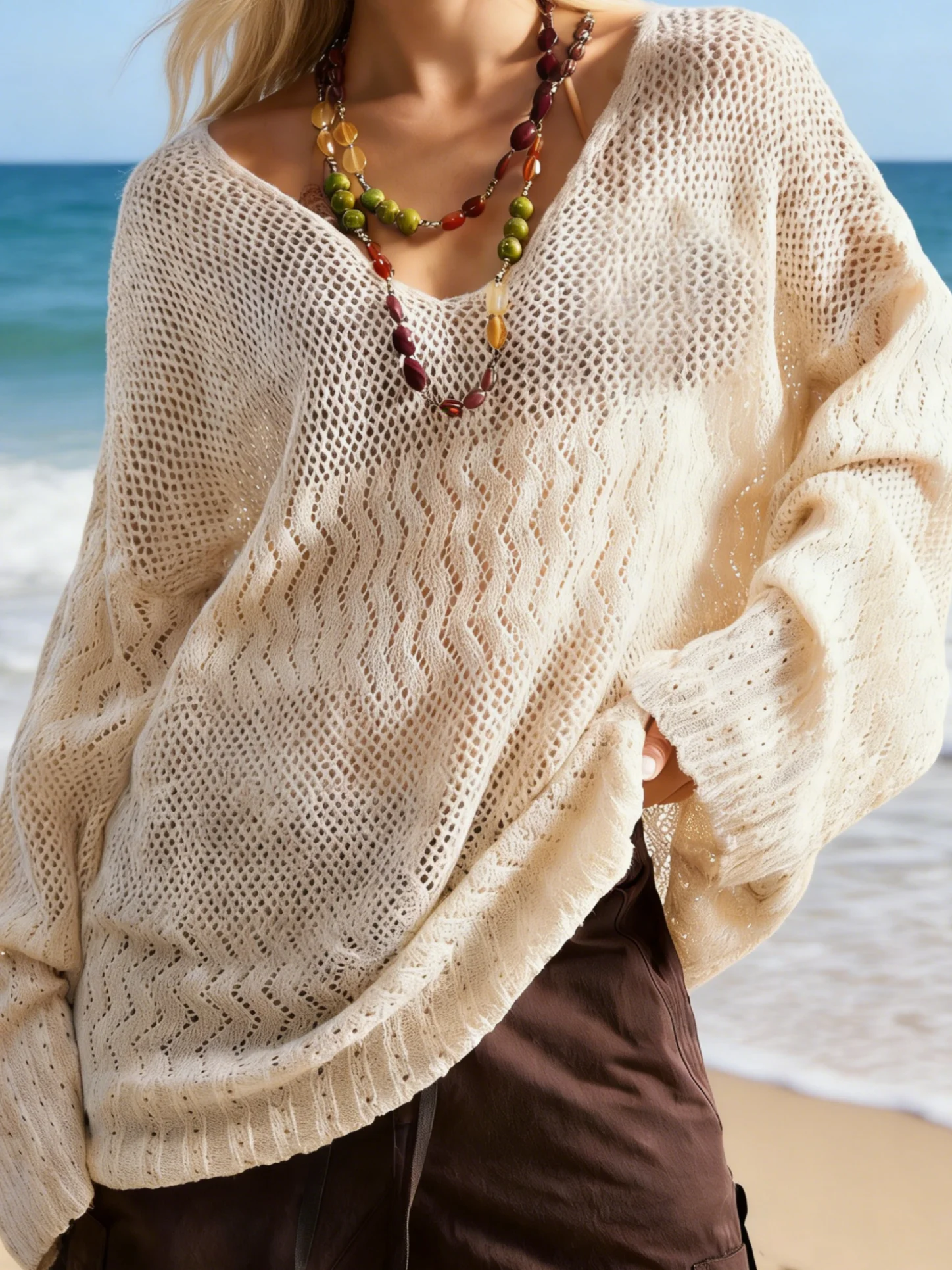 

Women's plus size casual vacation summer solid color hollow knitted long sleeved knitted pullover sweater