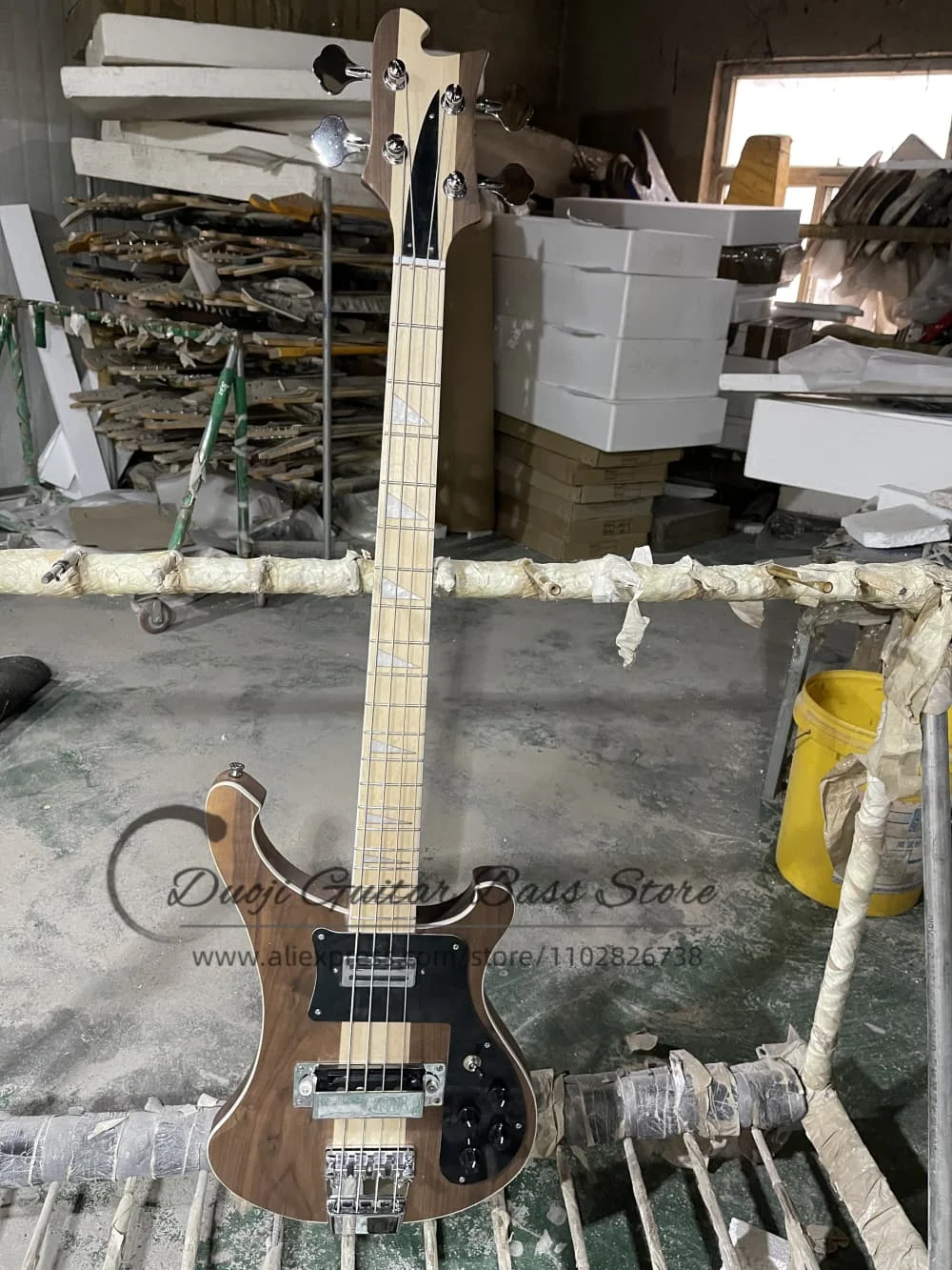 4 string walnut matte finish bass guitar, fixed bridge, maple neck through the solid body, black pickupguard Chrome hardware