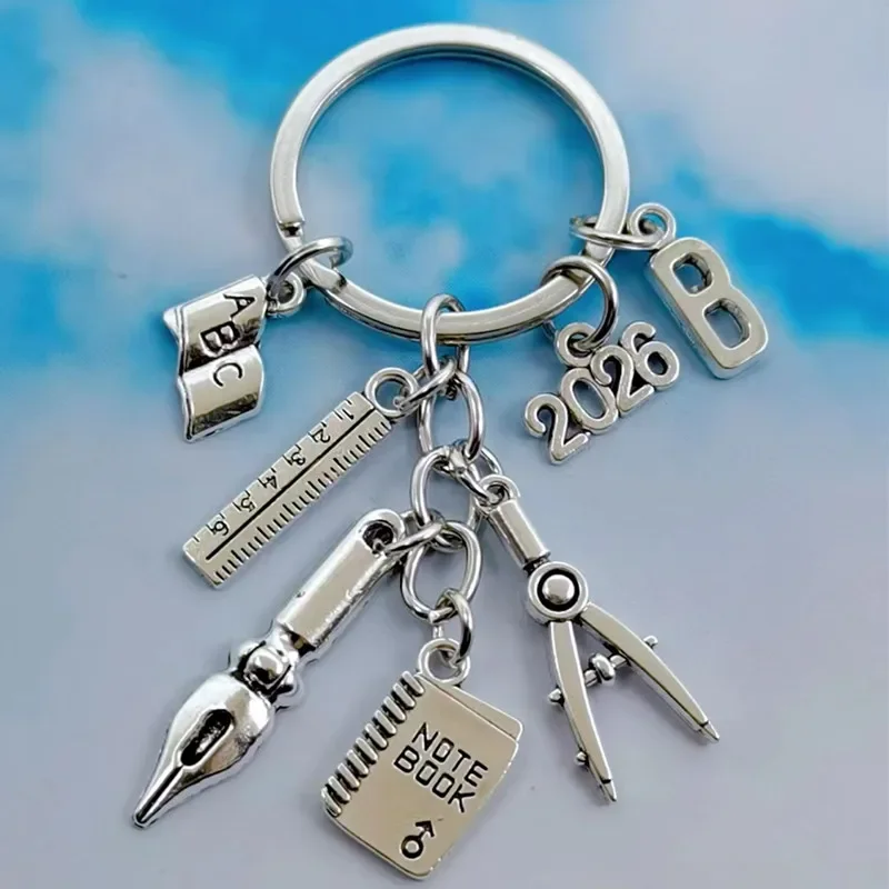 موضة جديدة A-Z رسالة القلم سحر البوصلة حاكم دفتر المعلم المفاتيح مدرسة المعلم هدية مجوهرات