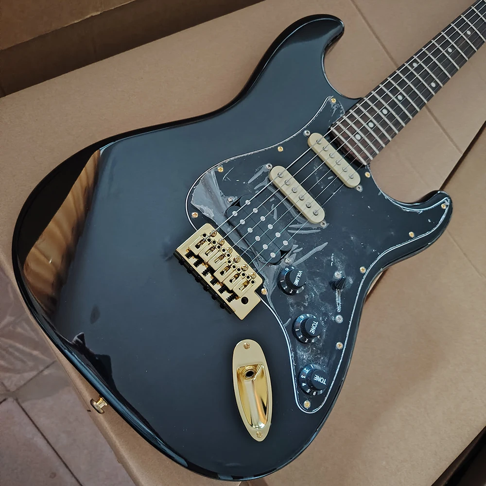 High quality in stock black electric guitar, gold hardware accessories, according to the buyer's address to choose the fastest t