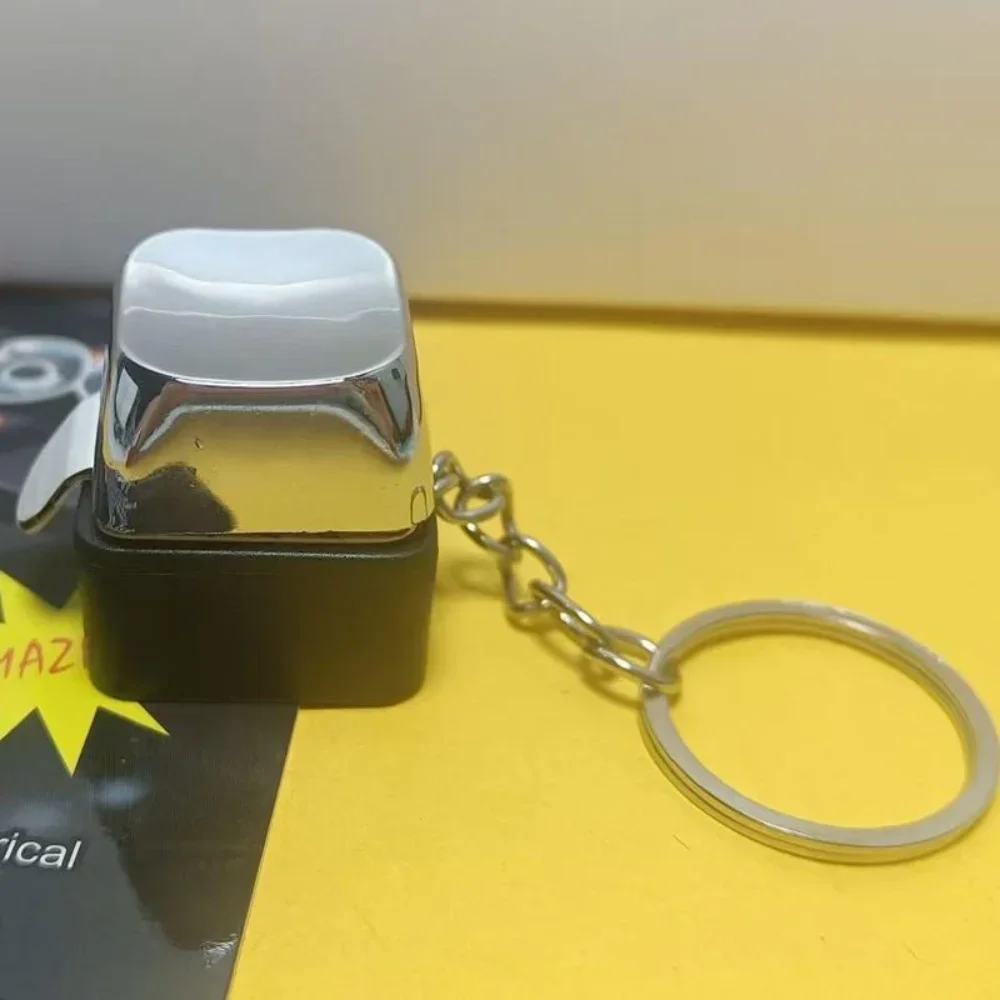 Elektrischer Schock-Tastatur-Schlüsselanhänger, Street-Trick, Neuheit, Fidget-Schlüsselanhänger, schockierender Handshake-Trick, Clicker-Spielzeug, 1 Stück – Detail 11