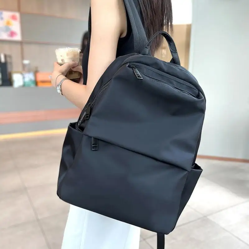 Outdoor leisure Oxford cloth backpack for women's travel, lightweight new waterproof large capacity fashionable commuting bag