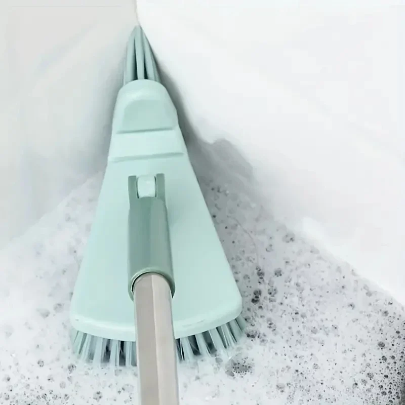 A long handled hard bristled triangular floor brush, bathroom tile gap cleaning brush